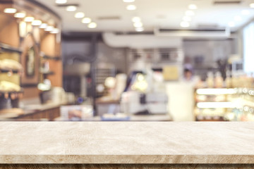 Empty brown cement table over blur cafe background, product and food display montage
