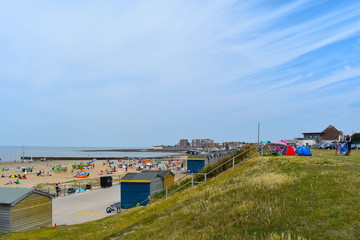  Tourists on their summer holidays, Minnis Bay, Birchington, Kent, UK