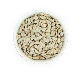 seed sunflower in bowl top view on white background.