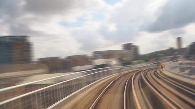 Time lapse. A train cab view. Departure of the train from the station.