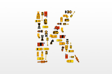 English letters formed by arrangement of Car toy diecast on the white background , Top view