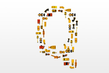 English letters formed by arrangement of Car toy diecast on the white background , Top view