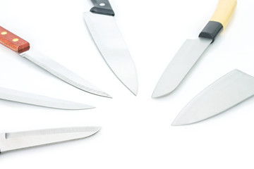 kitchen knife collection on white background.