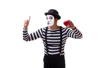 Mime holding red heart isolated on white background 