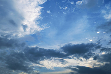 Naklejka na ściany i meble Blue sky with clouds and sunlight