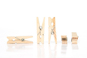 wooden clothes pin on white background.