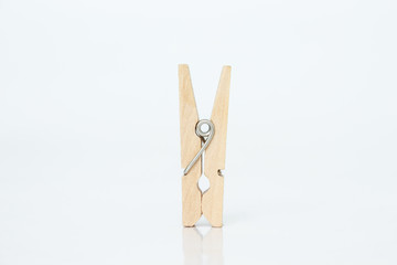 wooden clothes pin on white background.