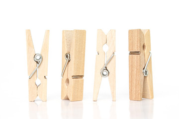 wooden clothes pin on white background.