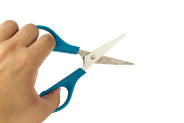 a hand holding scissors