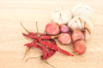 ingredients garlic, onion, chili food on wooden background