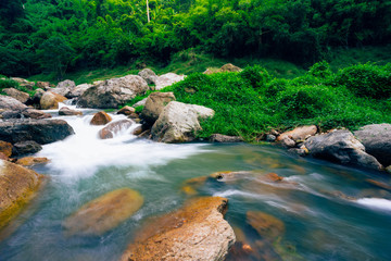 Naklejka na ściany i meble Beautiful waterfall in nature at Nakhon Nayok Province, Thailand
