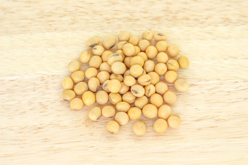 soy bean pile on wooden  background