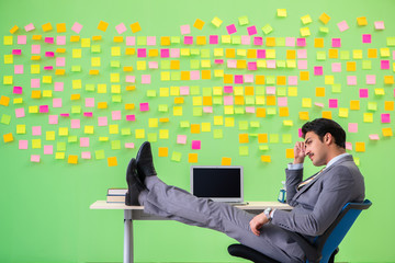 Businessman with many conflicting priorities   
