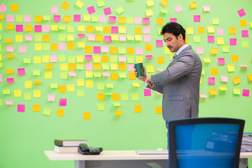 Businessman with many conflicting priorities   