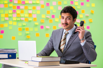 Businessman with many conflicting priorities   