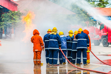 Obraz premium Firefighters in action ,Firefighters training