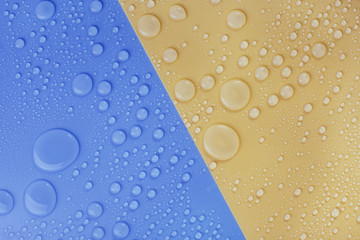 Water Drops on blue and yellow background.