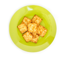 Naklejka premium craker on plate on white background.