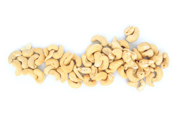 heap cashews top view on white background.
