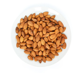 heap almonds top view on white background.