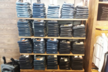 blurred photo, Blurry image, Jeans Denim pants on the shelves