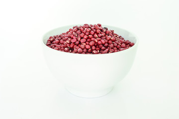 red bean seed in white bowl on white background