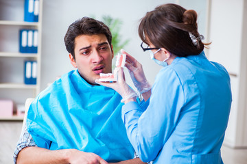 Patient afraid of dentist during doctor visit