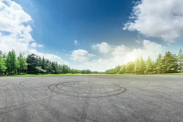 Fotobehang Pistache Empty asphalt road and green forest landscape  © ABCDstock