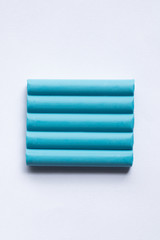 polymer clay handcraft for kids . line stick toy pattern product design . blue pastel colorful , minimal style .