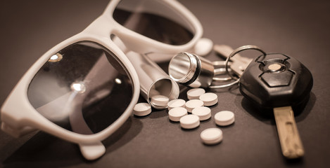 Sunglasses, Drugs, and Car Keys
