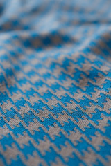 Fototapeta premium Close-up textile pattern in blue and grey colors as background