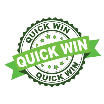 Green rubber stamp with quick win concept