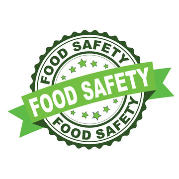 Green rubber stamp with food safety concept