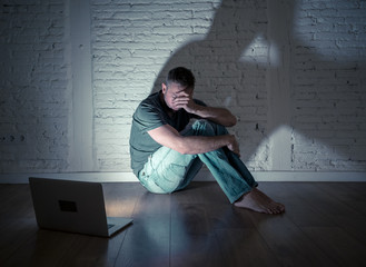 Men suffering Internet cyber bullying