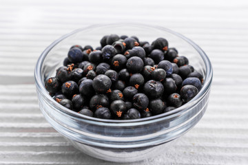 dried juniper berries on a white background