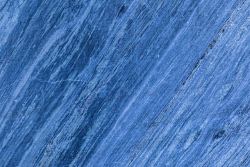 The background or texture of the marble wall of the quarry or opencast. The surface of the marble stone or rock