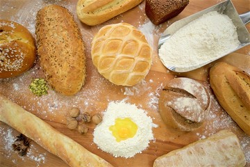 Many mixed breads on the table, shot from above