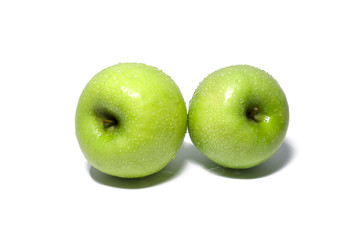 green apple with dew isolated on white background. food, healthy