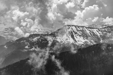 Black and white, alps and clouds