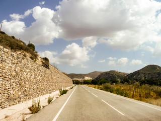 Stone wall along the road