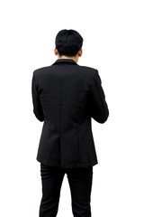 Rear view of a businessman looking at something in his hand.