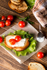 Homemade Burger with tomatoes and lettuce. Fast food.