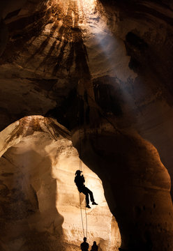 Silhouette of training alpinist in Luzit caves. Moshav Luzit, Ella Valley. Israel