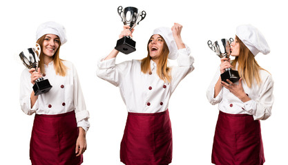 Set of Beautiful chef woman holding a trophy