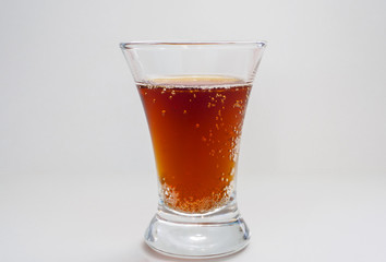 A fragrant drink in a crystal glass