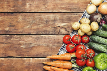 Fresh organic farm vegetables, Health care, on a wooden backgrou