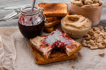 peanut paste on a wooden rustic background