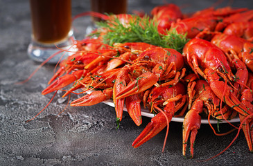 Crayfish. Red boiled crawfishes on table in rustic style, closeup. Lobster closeup. Border design