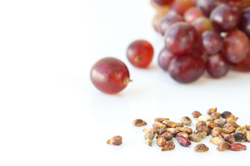 seed germinate red grapes on white background