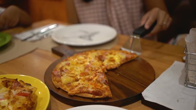 Slow motion, Pizza delivery to the plate.

